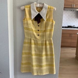 Vintage yellow dress with white collar.